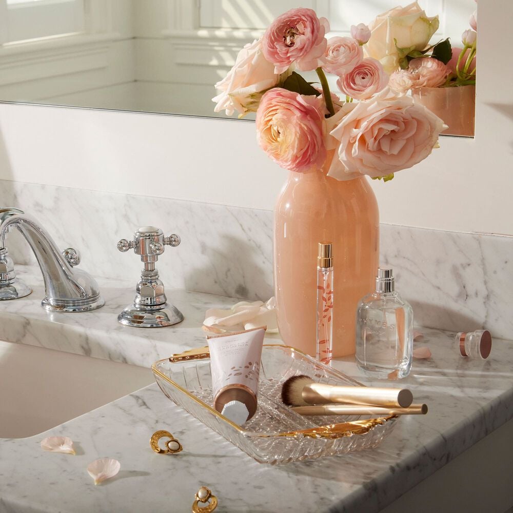 Goldleaf Gardenia Eau de Parfum featured on bathroom countertop next to flower vase and Goldleaf Gardenia products image number 1